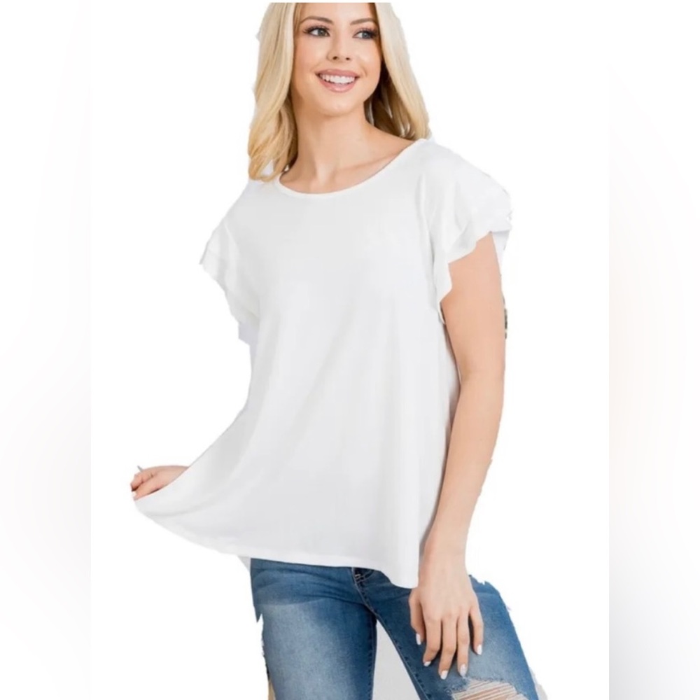 Perfect Peach cream color ruffle sleeve top.  Size Large.  Excellent condition.